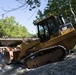 Removal of flood debris restricting drainage in Ellicott City