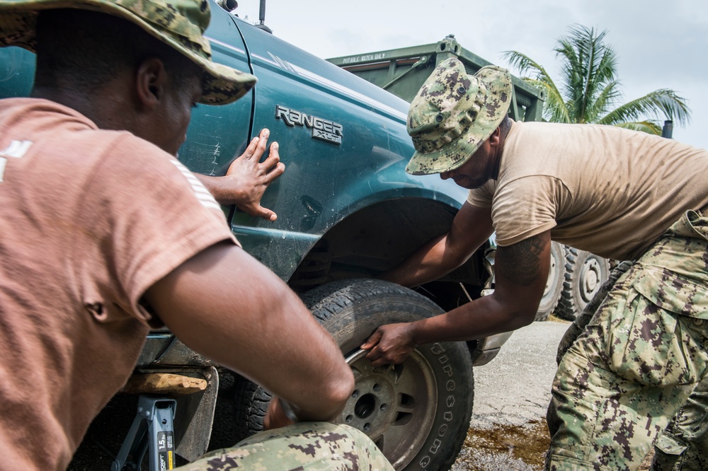 Seabees Change Local's Flat Tire