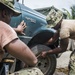 Seabees Change Local's Flat Tire