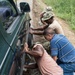 Seabees Change Local's Flat Tire