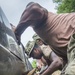 Seabees Change Local's Flat Tire