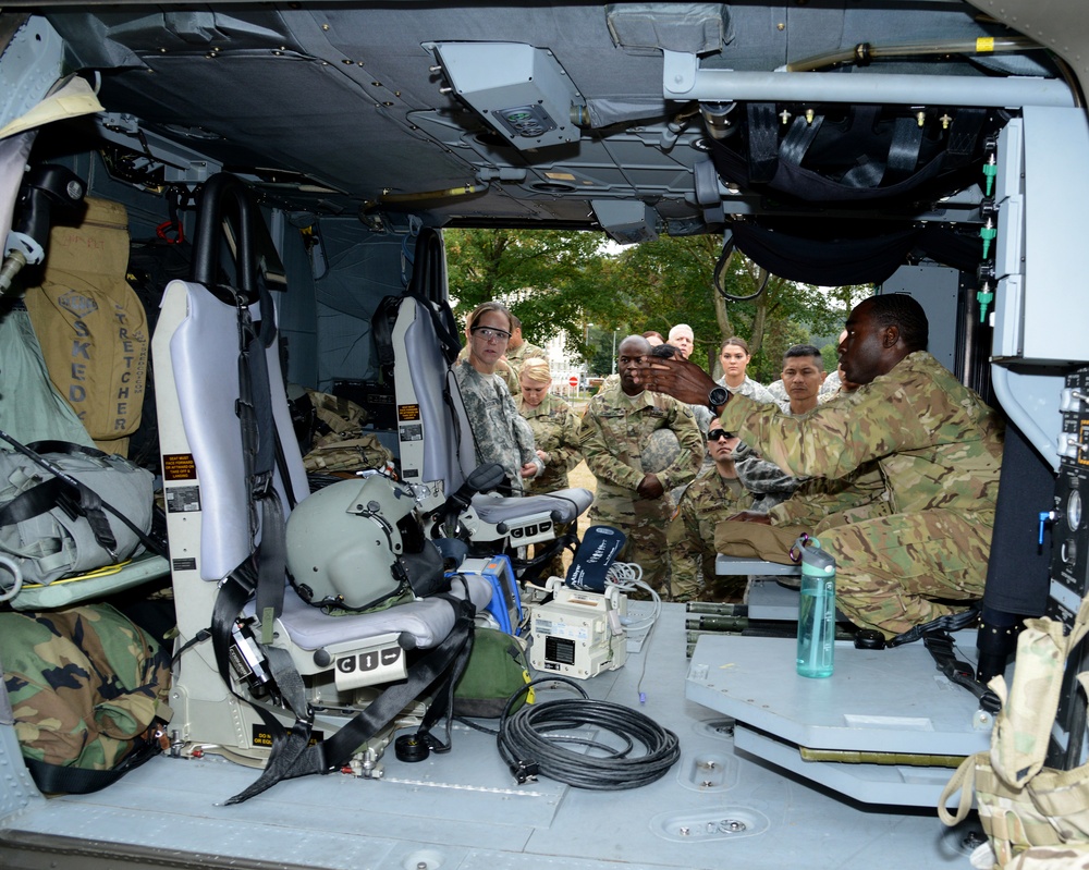 Army Reserve Medical Unit practices MEDEVAC with active duty Blackhawk