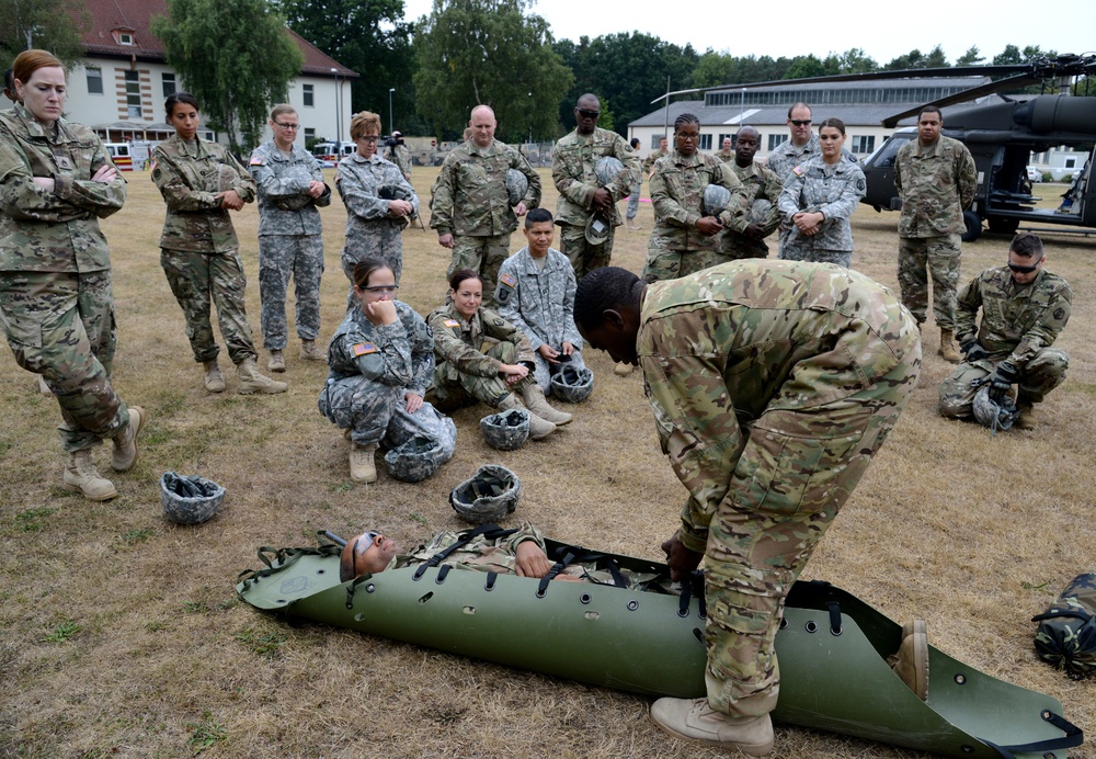 Army Reserve Medical Unit practices MEDEVAC with active duty Blackhawk