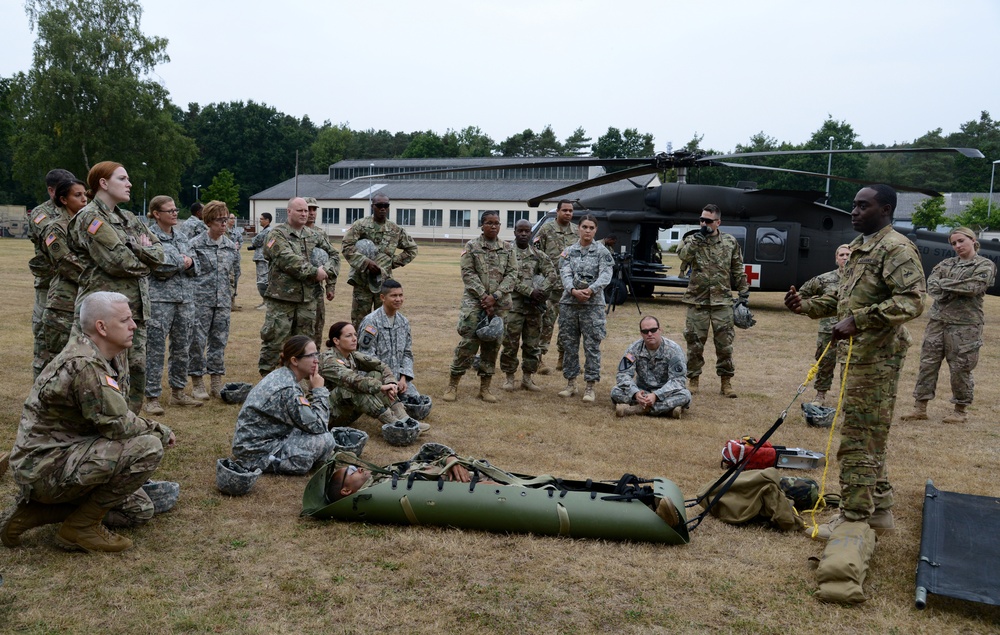 Army Reserve Medical Unit practices MEDEVAC with active duty Blackhawk