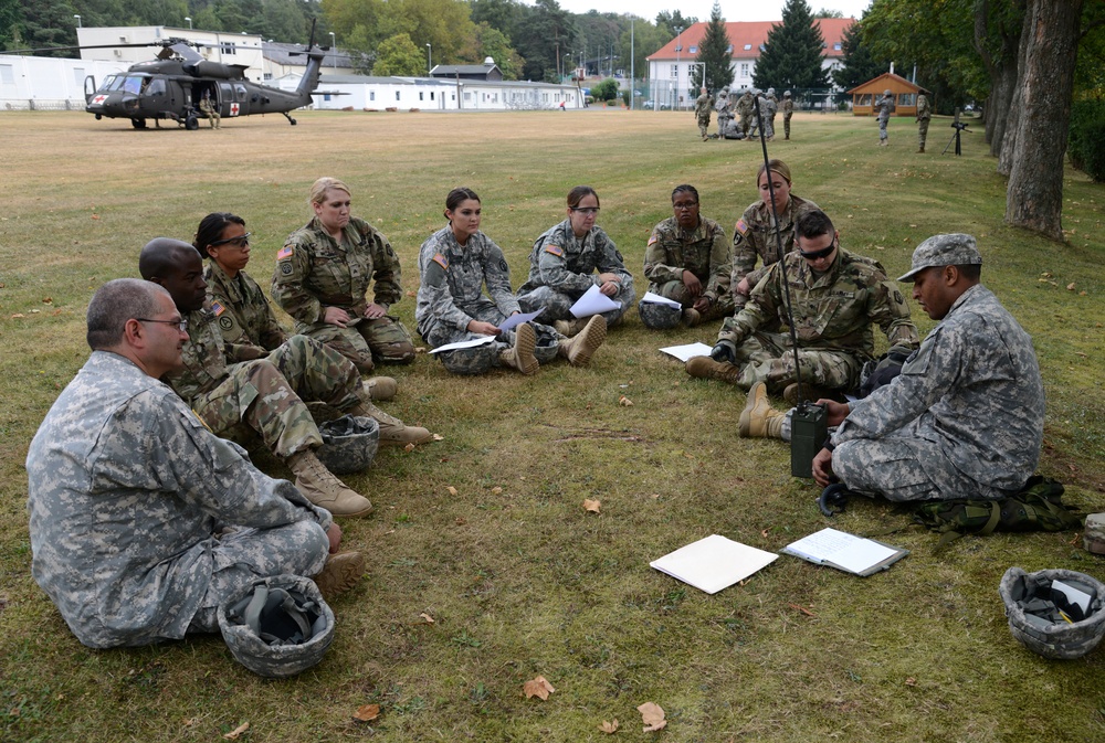 Army Reserve Medical Unit practices MEDEVAC with active duty Blackhawk