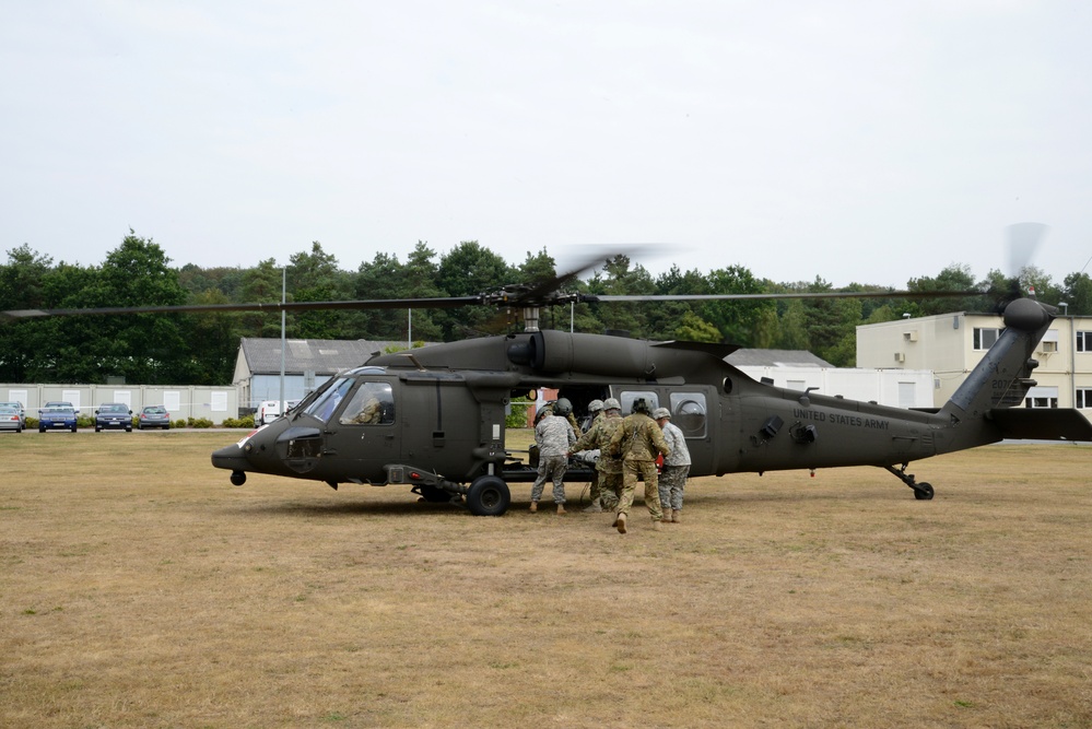 Army Reserve Medical Unit practices MEDEVAC with active duty Blackhawk