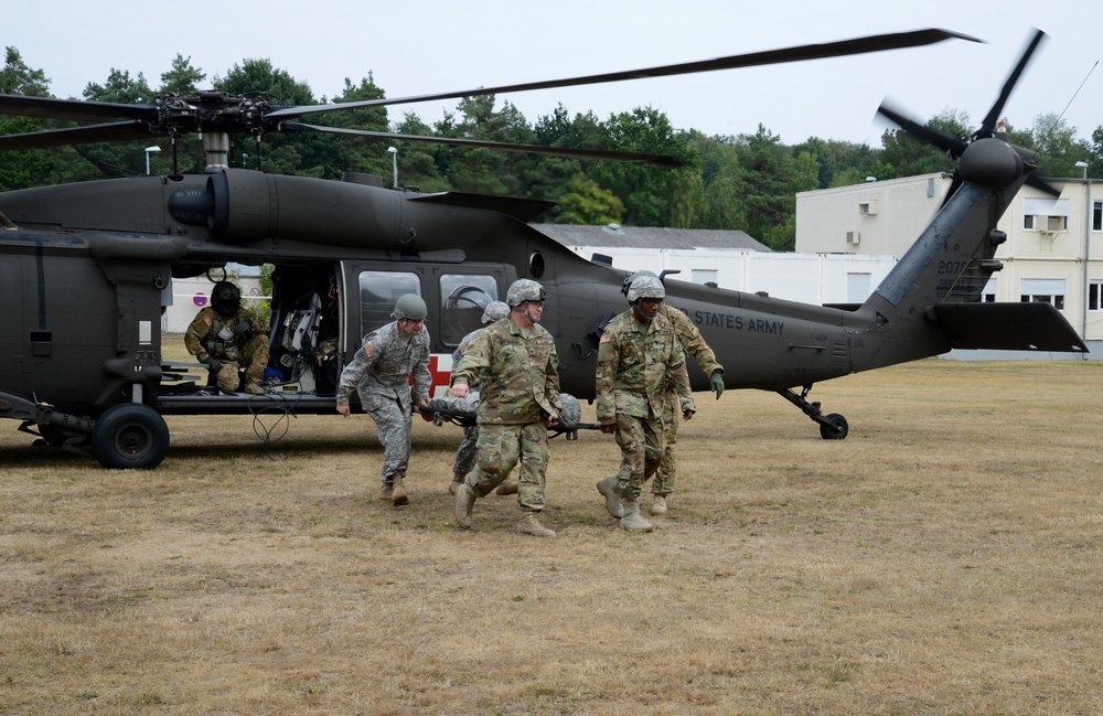 Army Reserve Medical Unit practices MEDEVAC with active duty Blackhawk