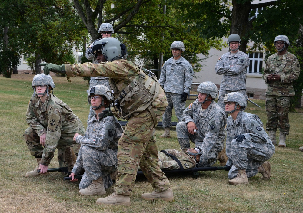 Army Reserve Medical Unit practices MEDEVAC with active duty Blackhawk