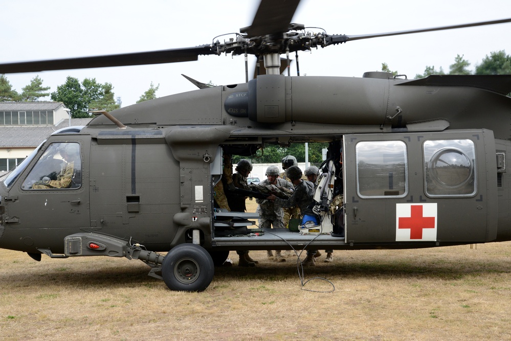 Army Reserve Medical Unit practices MEDEVAC with active duty Blackhawk