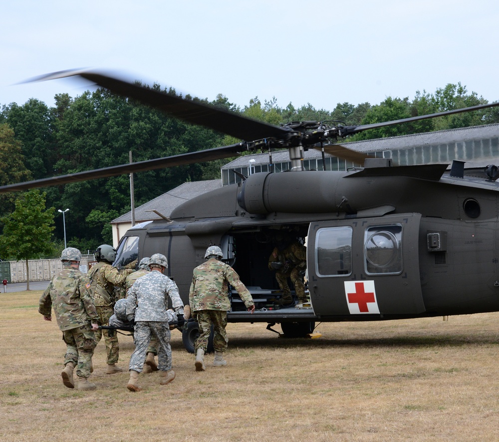 Army Reserve Medical Unit practices MEDEVAC with active duty Blackhawk