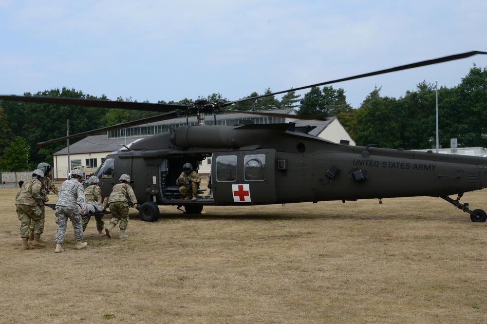 Army Reserve Medical Unit practices MEDEVAC with active duty Blackhawk