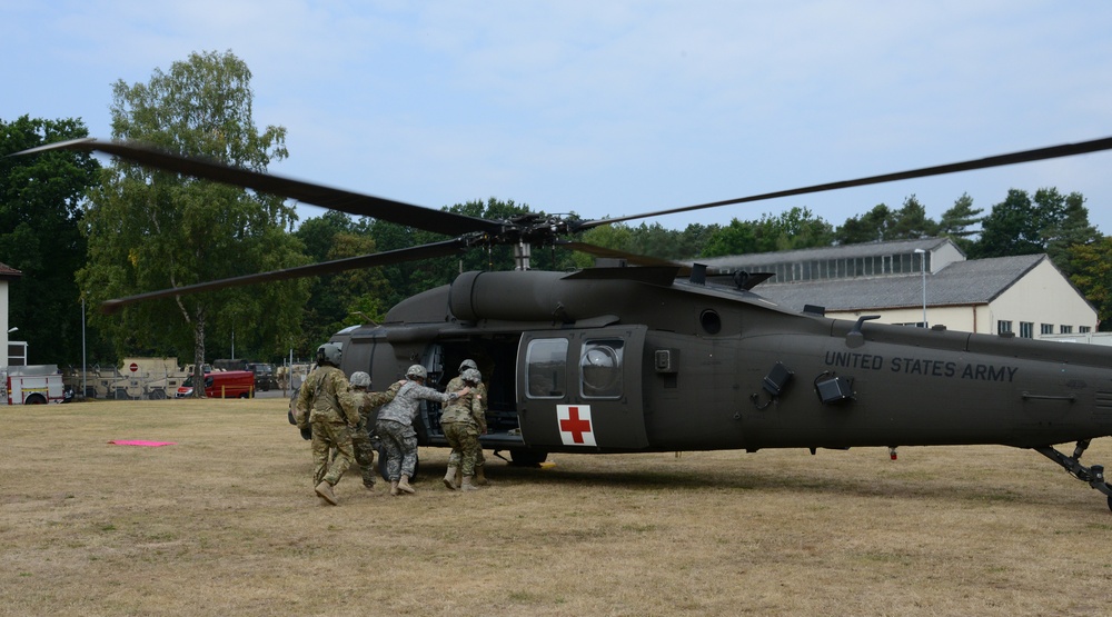 Army Reserve Medical Unit practices MEDEVAC with active duty Blackhawk