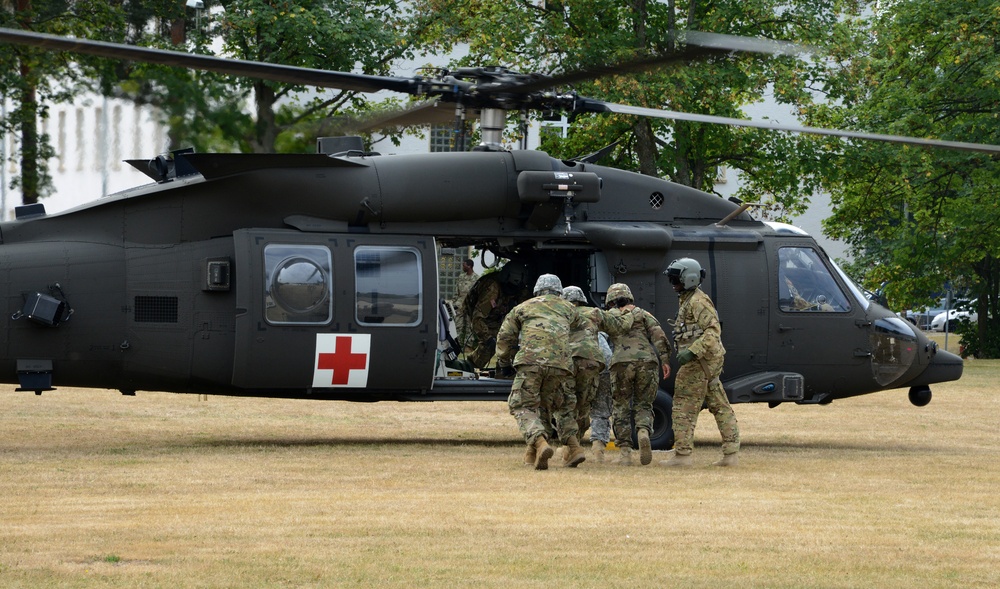 Army Reserve Medical Unit practices MEDEVAC with active duty Blackhawk