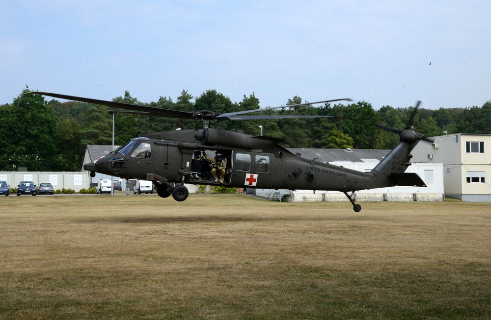 Army Reserve Medical Unit practices MEDEVAC with active duty Blackhawk