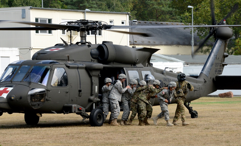 Army Reserve Medical Unit practices MEDEVAC with active duty Blackhawk