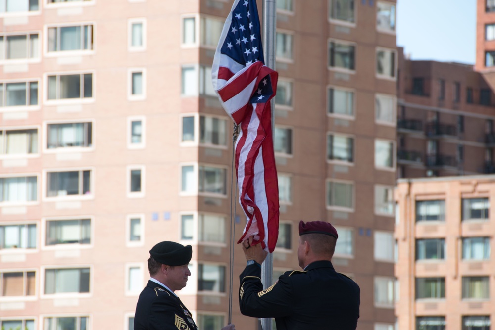 Special Forces Soldiers raise flag near ground zero