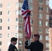 Special Forces Soldiers raise flag near ground zero