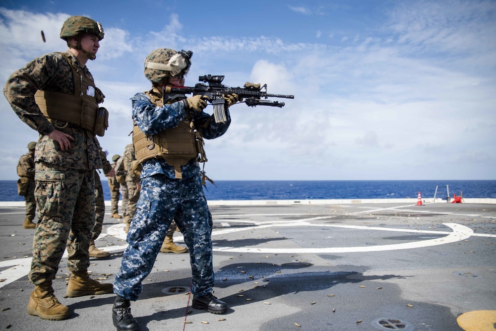 Green Bay Sailors and 31st MEU Marines fire M4 and M16 rifles on the ship’s flight deck
