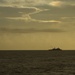 On the horizon, USS Green Bay (LPD 20) steams along