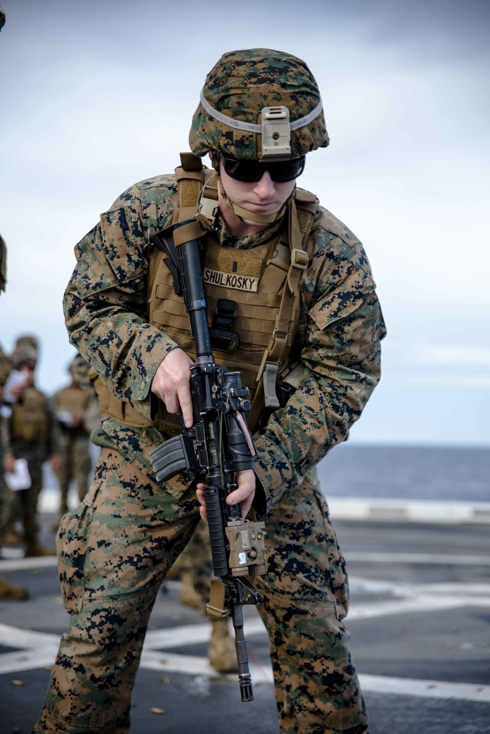 Green Bay Sailors and 31st MEU Marines fire M4 and M16 rifles on the ship’s flight deck