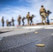 Green Bay Sailors and 31st MEU Marines fire M4 and M16 rifles on the ship’s flight deck