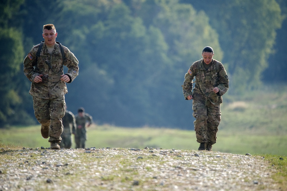 U.S. Soldiers with the 554th Military Police Company, 709th Military Police Battalion, 18th Military Police participate in the fourth annual &quot;Clifton Challenge&quot;