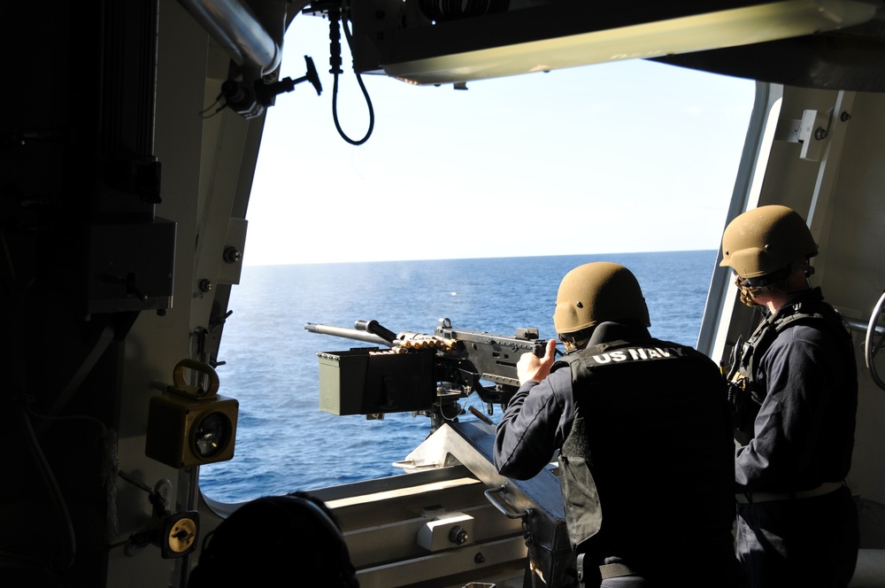 USS Zumwalt Sailors conduct crew served weapons firing exercise