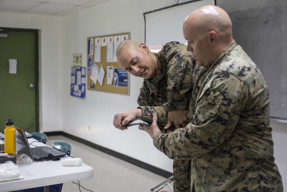 Valiant Shield 16: Tinian locals recieve combat lifesaving class from Marine Air Control Group 18