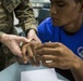Valiant Shield 16: Tinian locals recieve combat lifesaving class from Marine Air Control Group 18