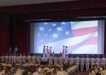 Newly-pinned CPOs Line the Stage During their Pinning Ceremony in Guam Sept. 16