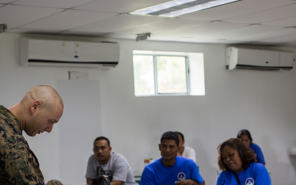 Valiant Shield 16: Tinian locals recieve combat lifesaving class from Marine Air Control Group 18