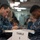 USS America (LHA 6) Saliors take the E-4 Advancement Exam