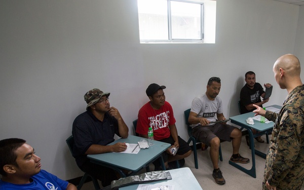 Valiant Shield 16: Tinian locals recieve combat lifesaving class from Marine Air Control Group 18
