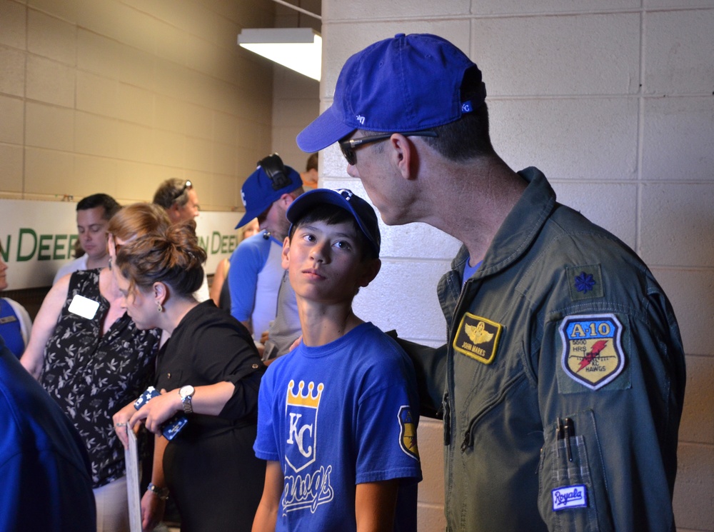 442nd FW member throws opening pitch