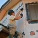 Structural specialists renovate softball field press box