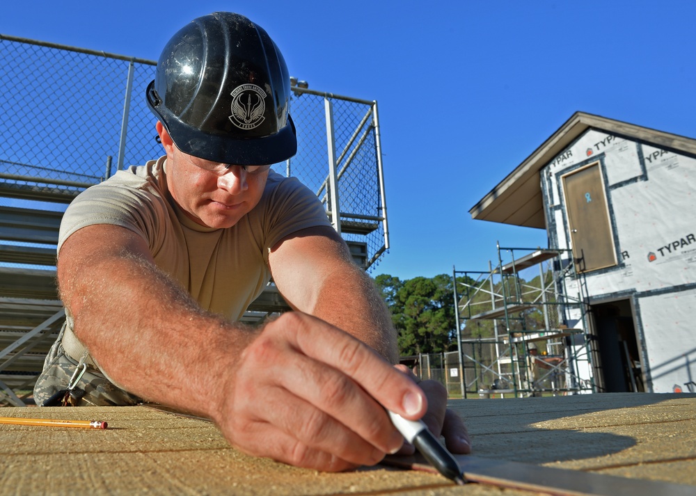 Structural specialists renovate softball field press box