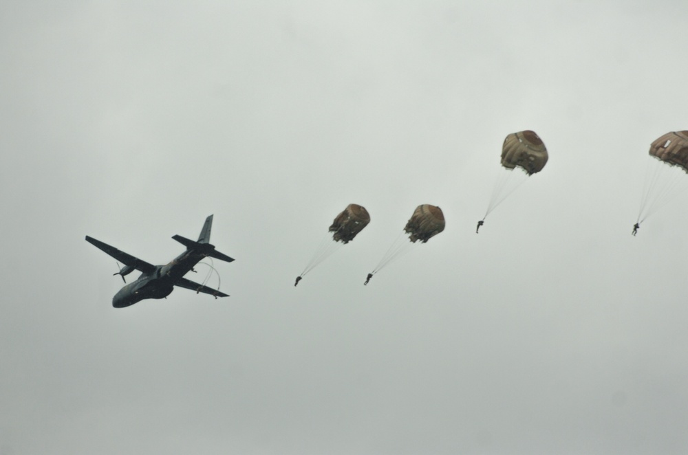 Skies open up with French and American Paratroopers during Colibri
