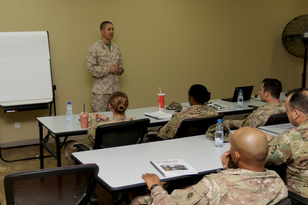 Multinational forces complete aid course
