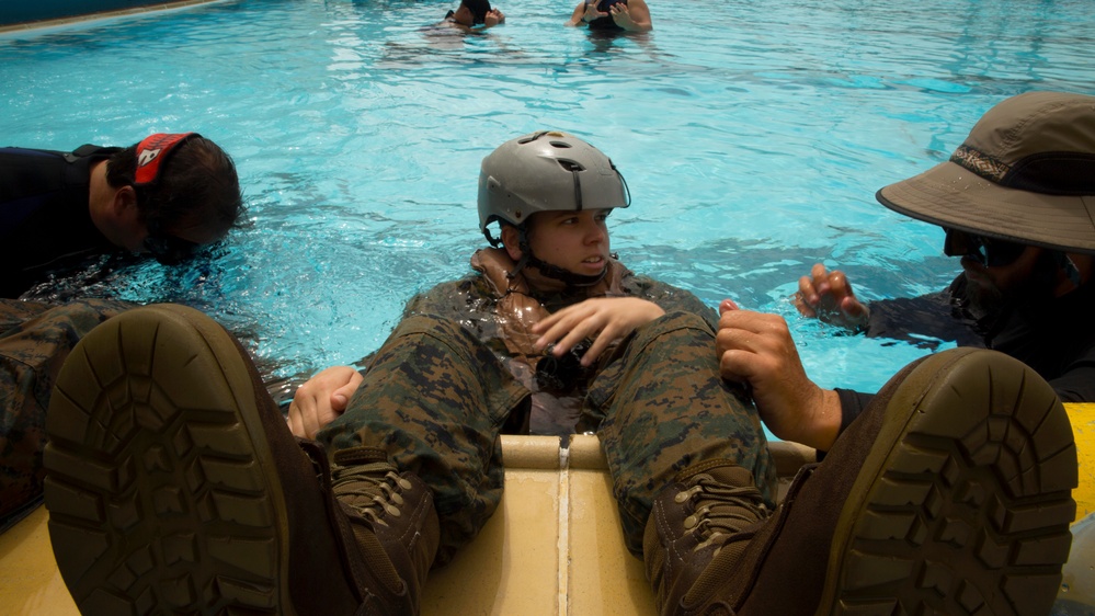 Marines dive into Modular Amphibious Egress Training