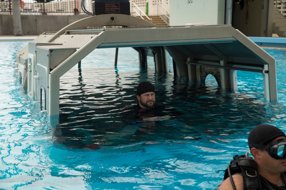 Marines dive into Modular Amphibious Egress Training