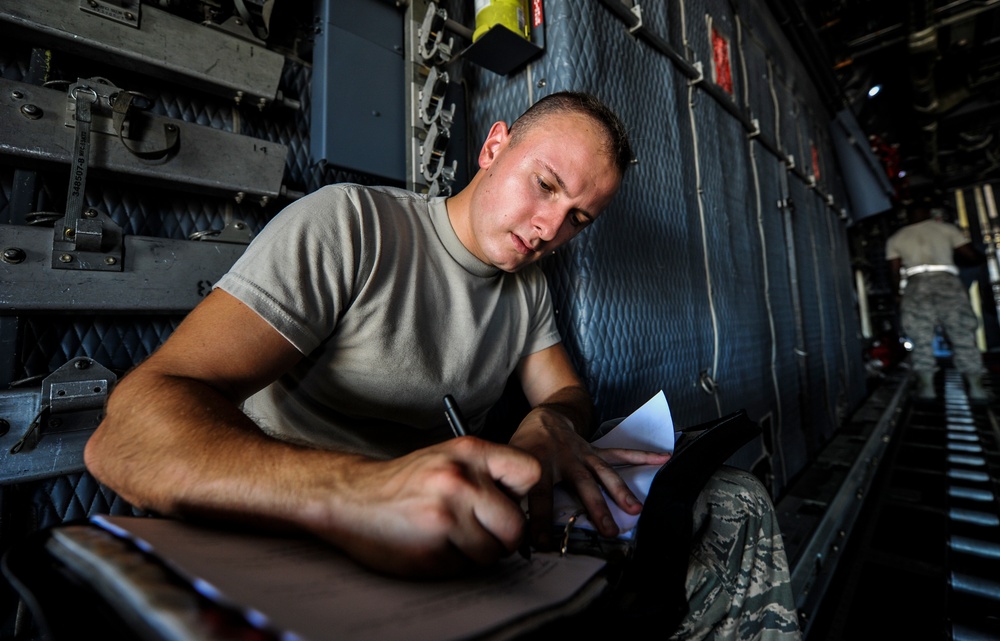 15th AMU Airmen keep the props turning