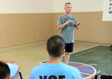 Valiant Shield participants engage with Youth Correctional Facility students