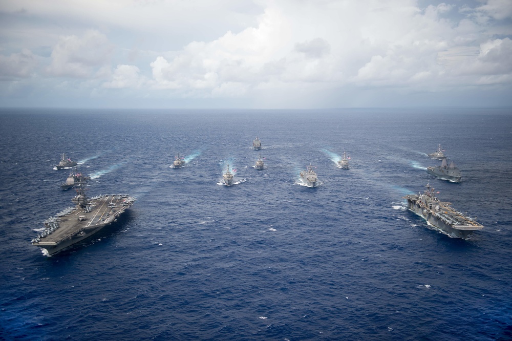 USS Ronald Reagan (CVN 76) and USS Bonhomme Richard (LHD 6) lead a formation of Carrier Strike Group Five and Expeditionary Strike Group Seven Ships