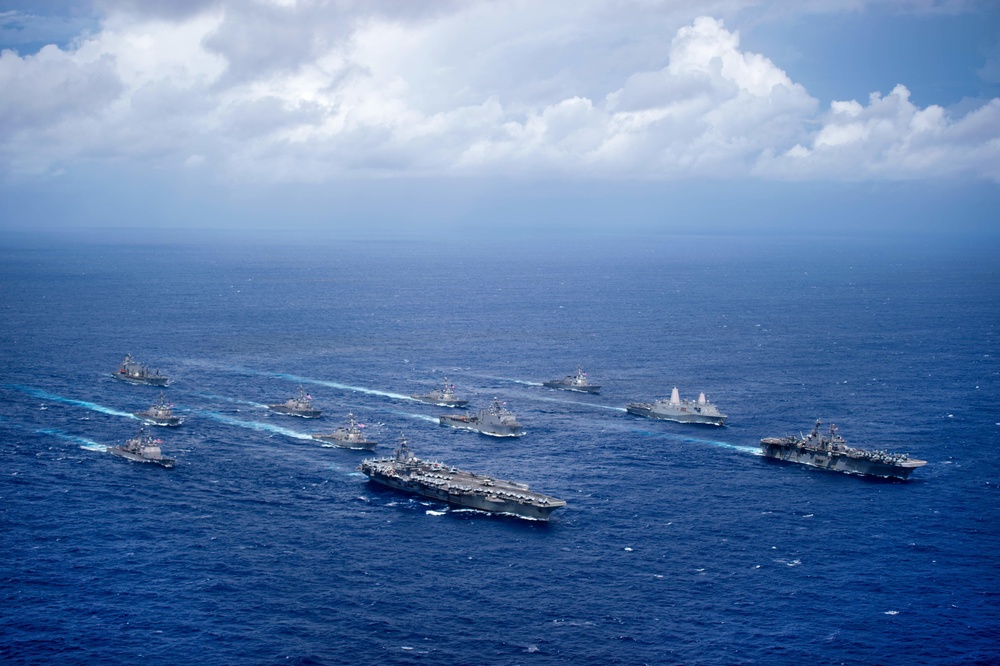 USS Ronald Reagan (CVN 76) and USS Bonhomme Richard (LHD 6) lead a formation of Carrier Strike Group Five and Expeditionary Strike Group Seven Ships