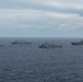 Amphibious Ships and Destroyer Conduct Photo Exercise