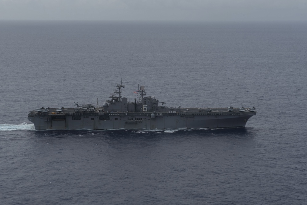 Amphibious Ships and Destroyer Conduct Photo Exercise