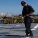 USS Zumwalt Sailor conducts maintenance