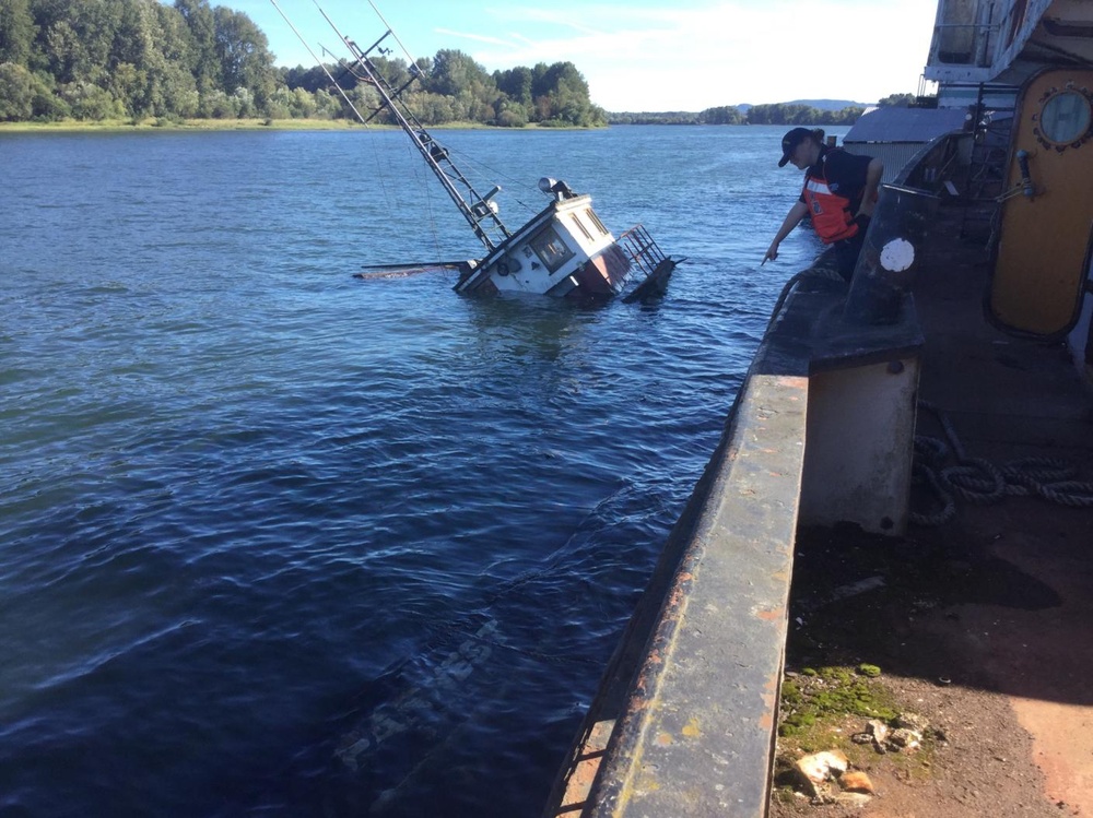 Coast Guard responds to sunken tugboat