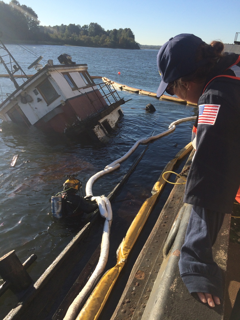 Coast Guard monitors cleanup of oil product