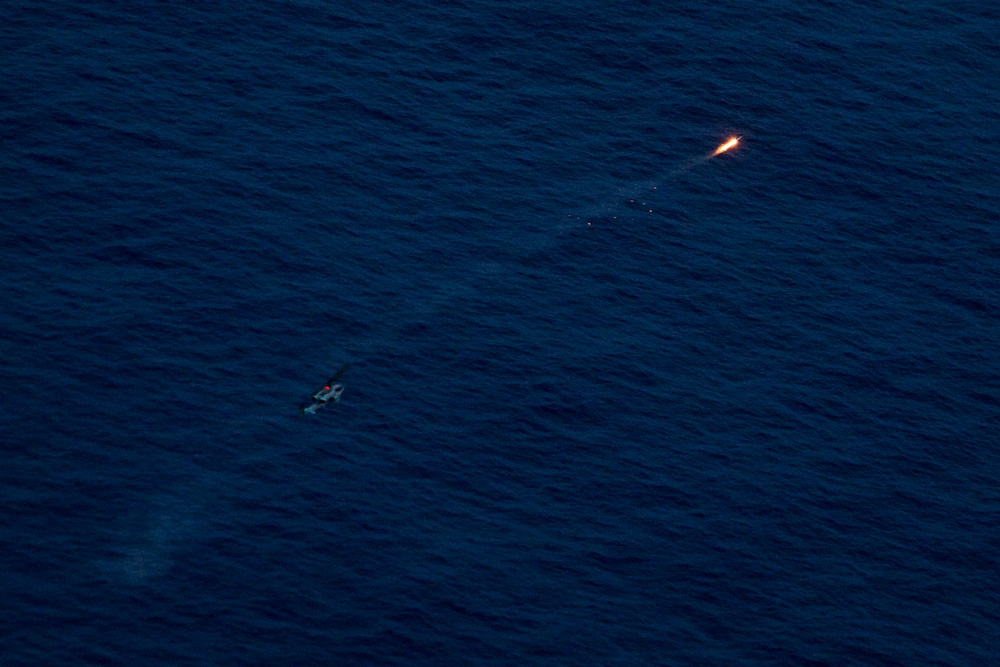 Super Cobra fires AIM-9 missile